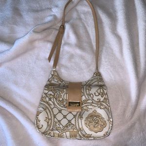 cream and gold handbag, matches with every outfit!
